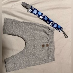 Newborn boy pant never used and pacifier clip never used